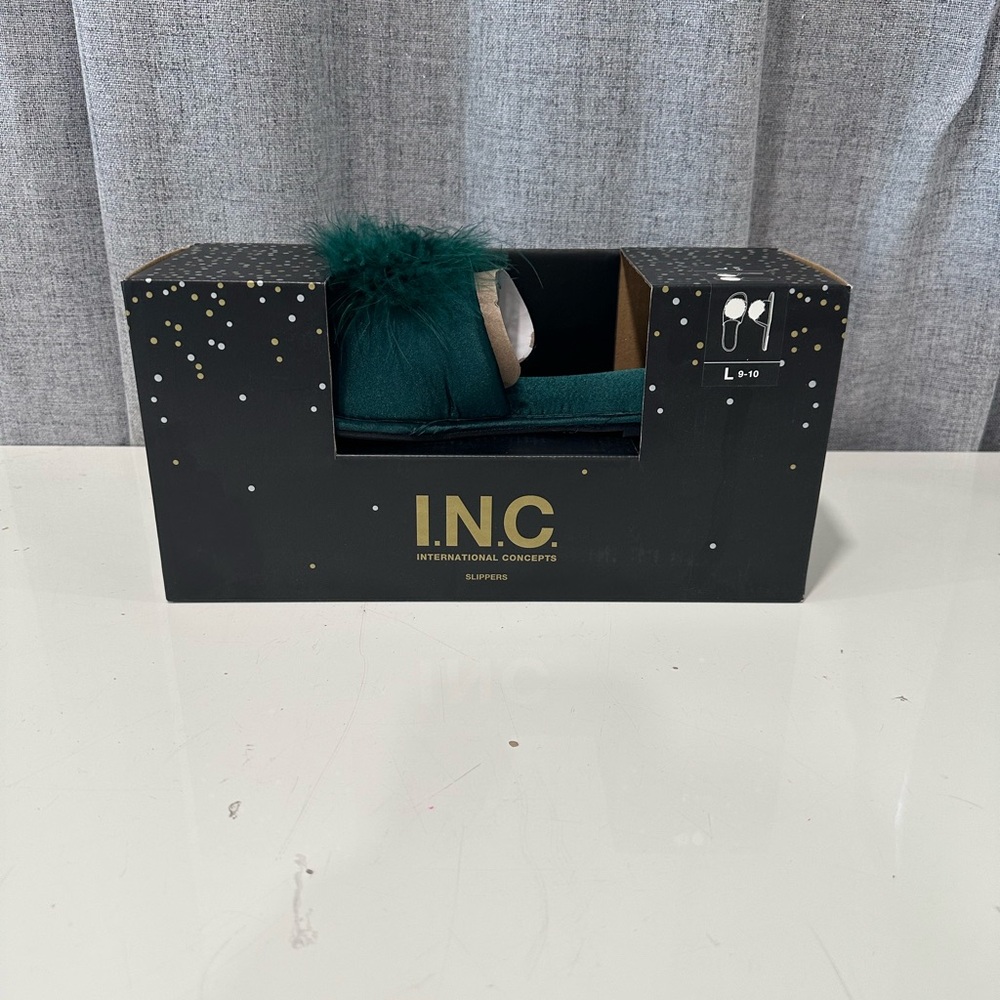 INC women’s green satin Pom slide boxed slippers size 9-10 NWT.